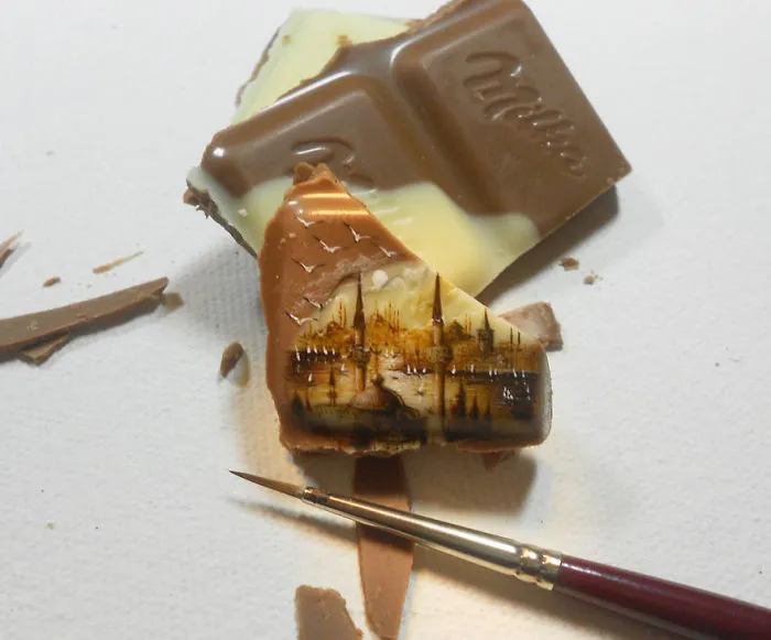 Turkish Artist Paints Unbelievably Tiny Paintings Onto Small Objects