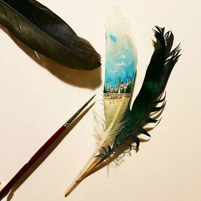 Turkish Artist Paints Unbelievably Tiny Paintings Onto Small Objects
