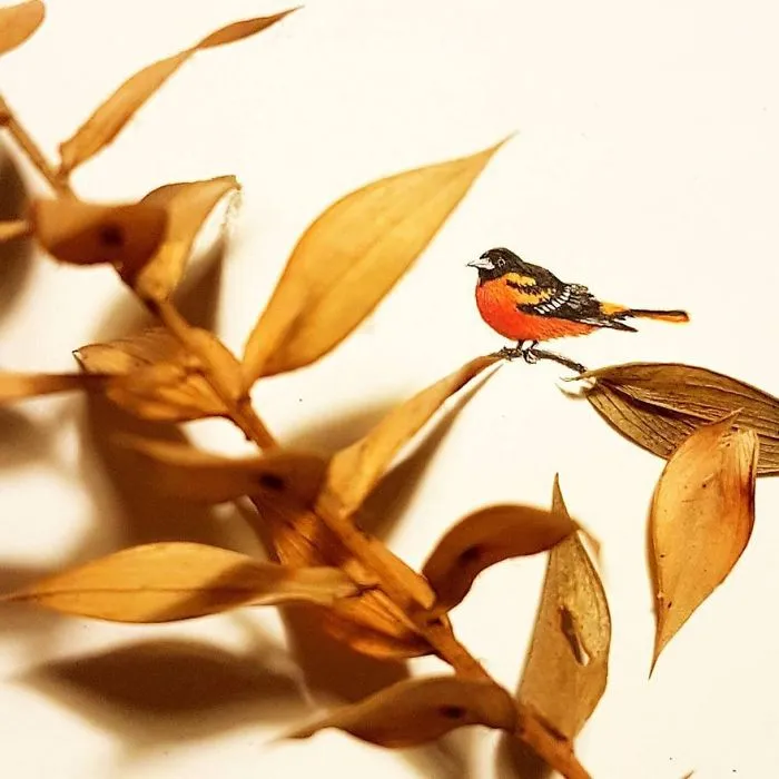 Turkish Artist Paints Unbelievably Tiny Paintings Onto Small Objects
