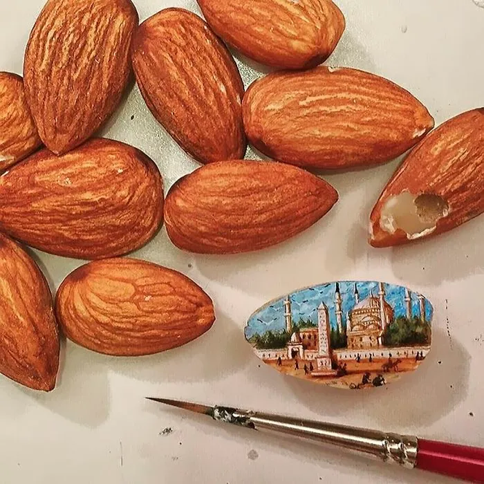 Turkish Artist Paints Unbelievably Tiny Paintings Onto Small Objects