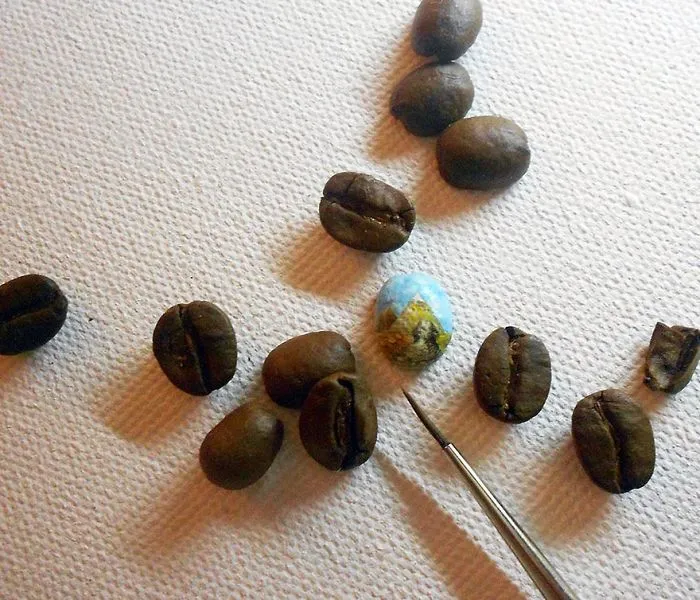 Turkish Artist Paints Unbelievably Tiny Paintings Onto Small Objects