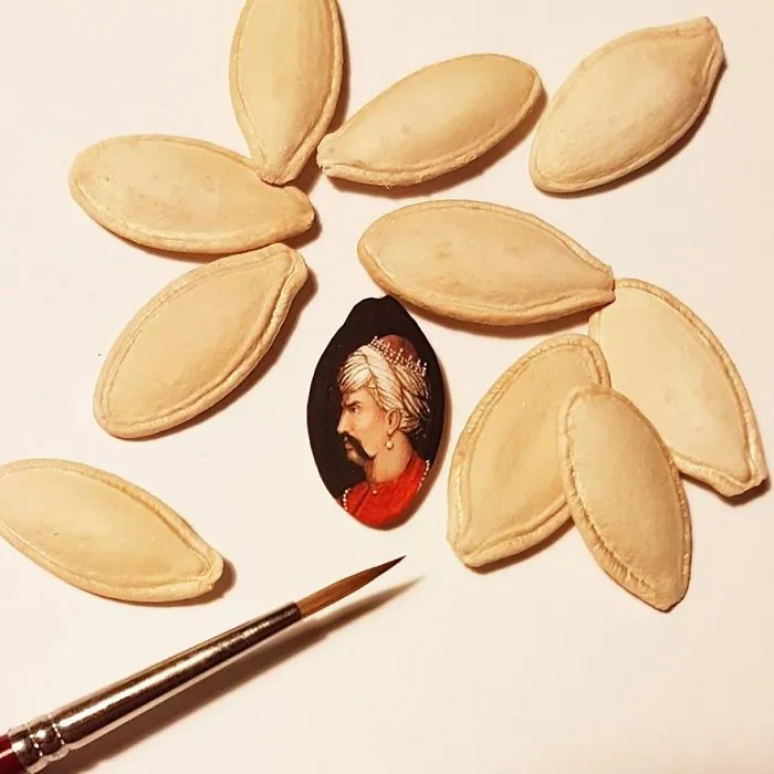 Turkish Artist Paints Unbelievably Tiny Paintings Onto Small Objects