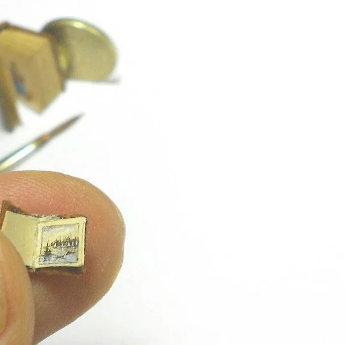 Turkish Artist Paints Unbelievably Tiny Paintings Onto Small Objects