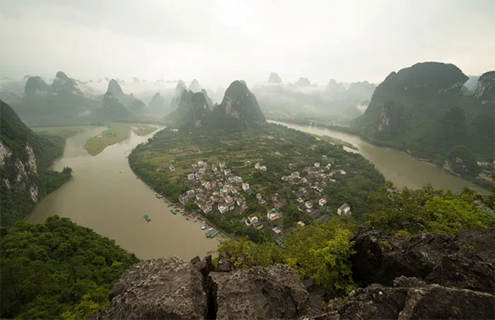 Beautiful landscape view of a river and mountains before Photoshop, highlighting natural beauty and truth in photos.