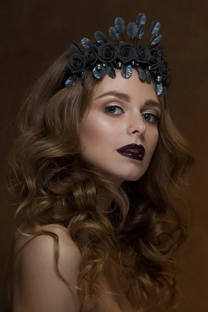 Before and after Photoshop reveals woman with dark lipstick and floral headpiece against a brown background.