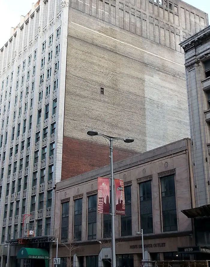 This Single Window On The Side Of A Building