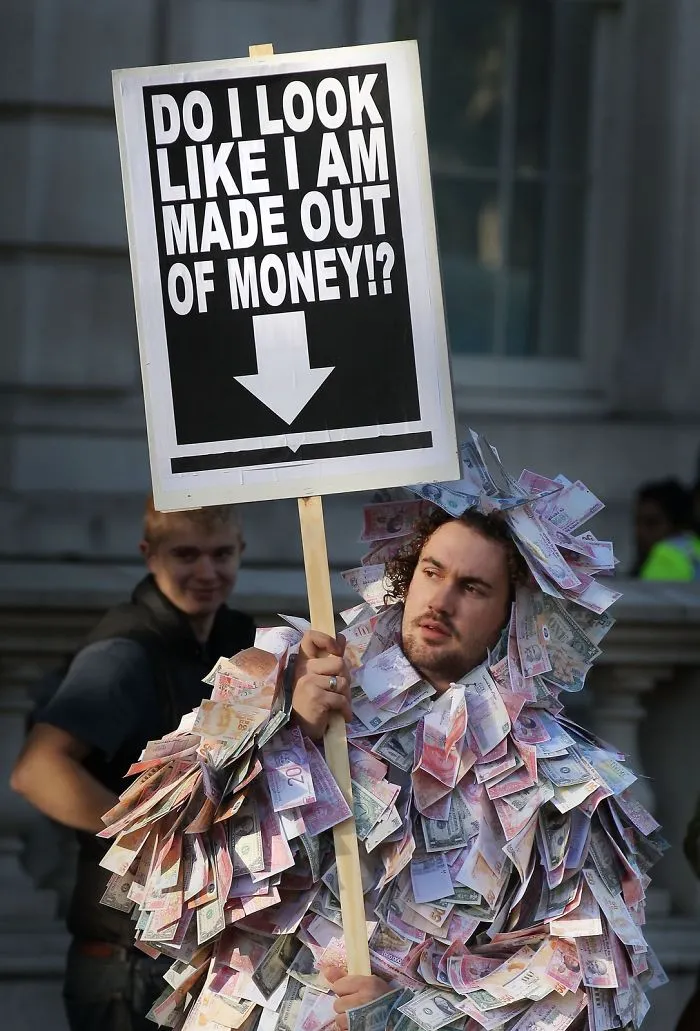 Protesting Against The Government's Proposed Funding Cuts To Education And An Increase In Tuition Fees In London