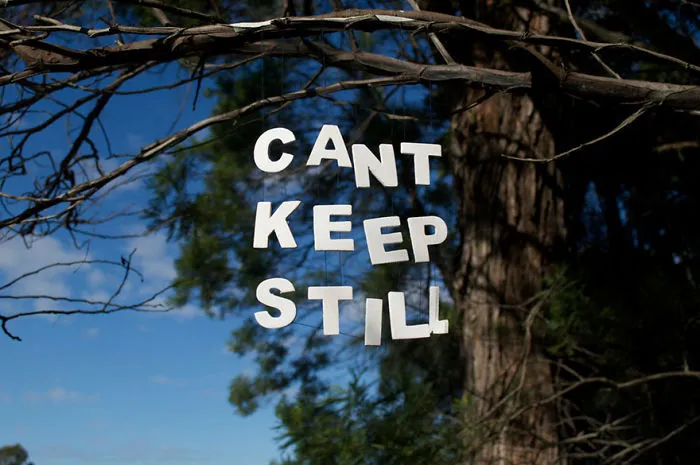 Text Hung With Thread In A Local Park