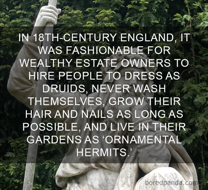 Statue of a druid with text about 18th-century English garden hermits, offering amazing facts on historical lifestyles.