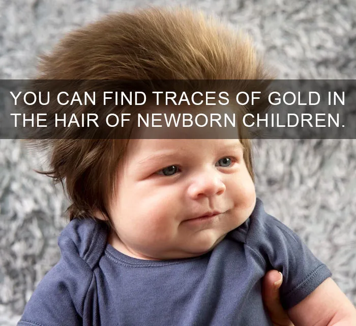 Baby with fluffy hair and text overlay about traces of gold, aligning with amazing facts theme.
