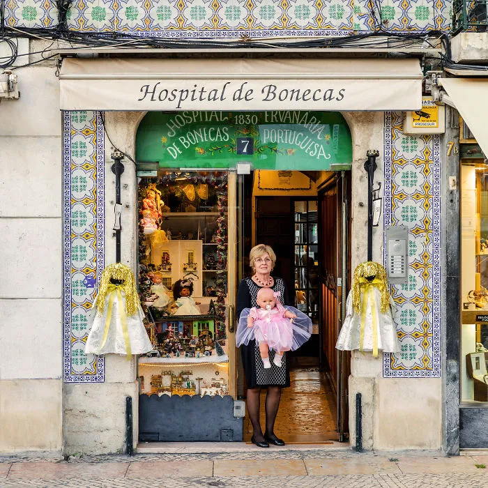 Manuela Cutileiro And One Of The Dolls Cured At Her Doll Hospital