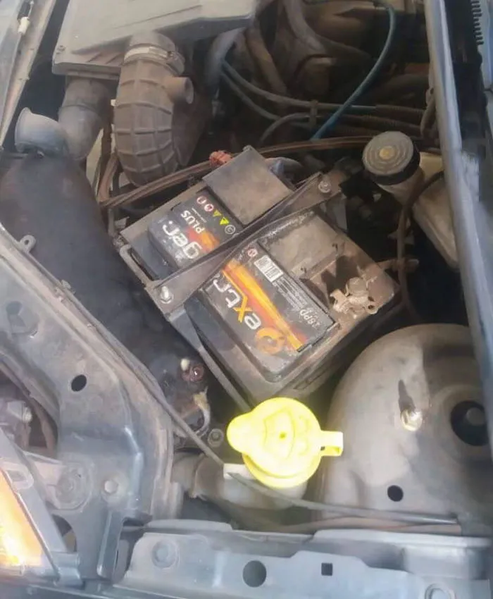 Car engine with battery; hidden detail that might freak you out.