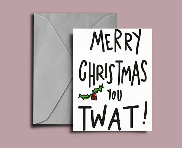 Rude Christmas card with envelope, featuring humorous text: "Merry Christmas You Twat!" on pink background.