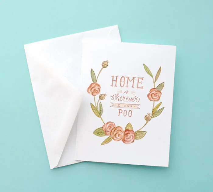 Rude Christmas card with floral design reads "Home is wherever I can poo" for a twisted sense of humor.