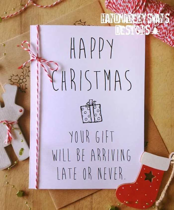 Rude Christmas card with text: "Your gift will be arriving late or never," on a festive background.
