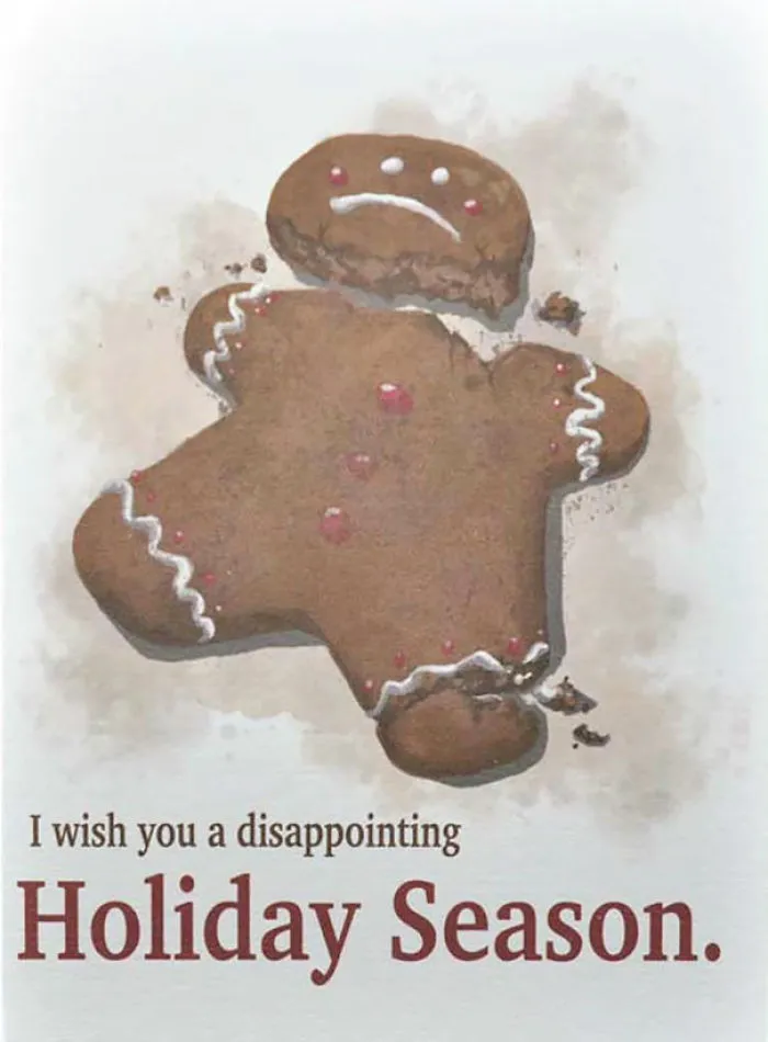 Rude Christmas card with a broken gingerbread man and the text "I wish you a disappointing holiday season."