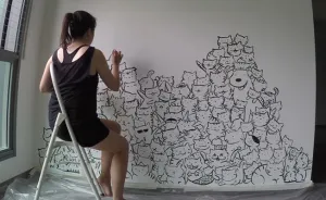 I Painted A Mountain Of Cats On A Blank Wall To Bring It To Life