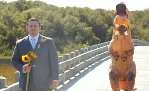 This Bride Wore A T-Rex Costume To Pull A Hilarious 'First Look' Prank On Groom, And His Reaction Is Priceless