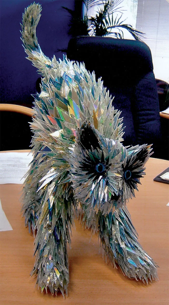 Artist Turns Old CDs Into Amazing Sculptures Instead Of Throwing Them Away