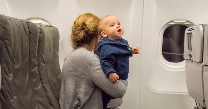 Mom's Brutally Honest Post Explains Why You Don't Owe Strangers Candy For Sitting Next To Your Babies