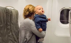 Mom's Brutally Honest Post Explains Why You Don't Owe Strangers Candy For Sitting Next To Your Babies