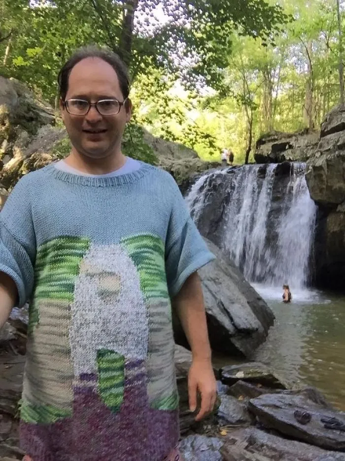 Guy Makes Sweaters Of Places And Then Photographs Himself In Those Places