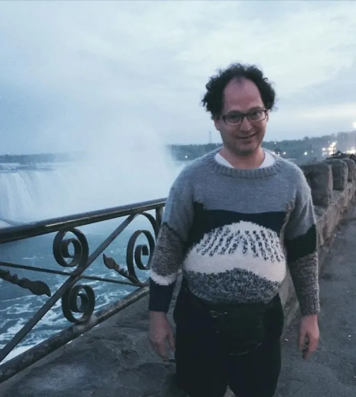 Guy Makes Sweaters Of Places And Then Photographs Himself In Those Places