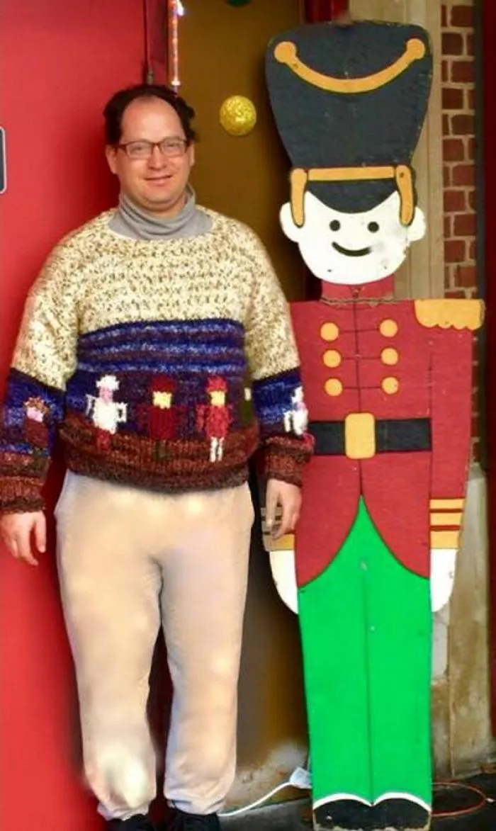 Guy Makes Sweaters Of Places And Then Photographs Himself In Those Places