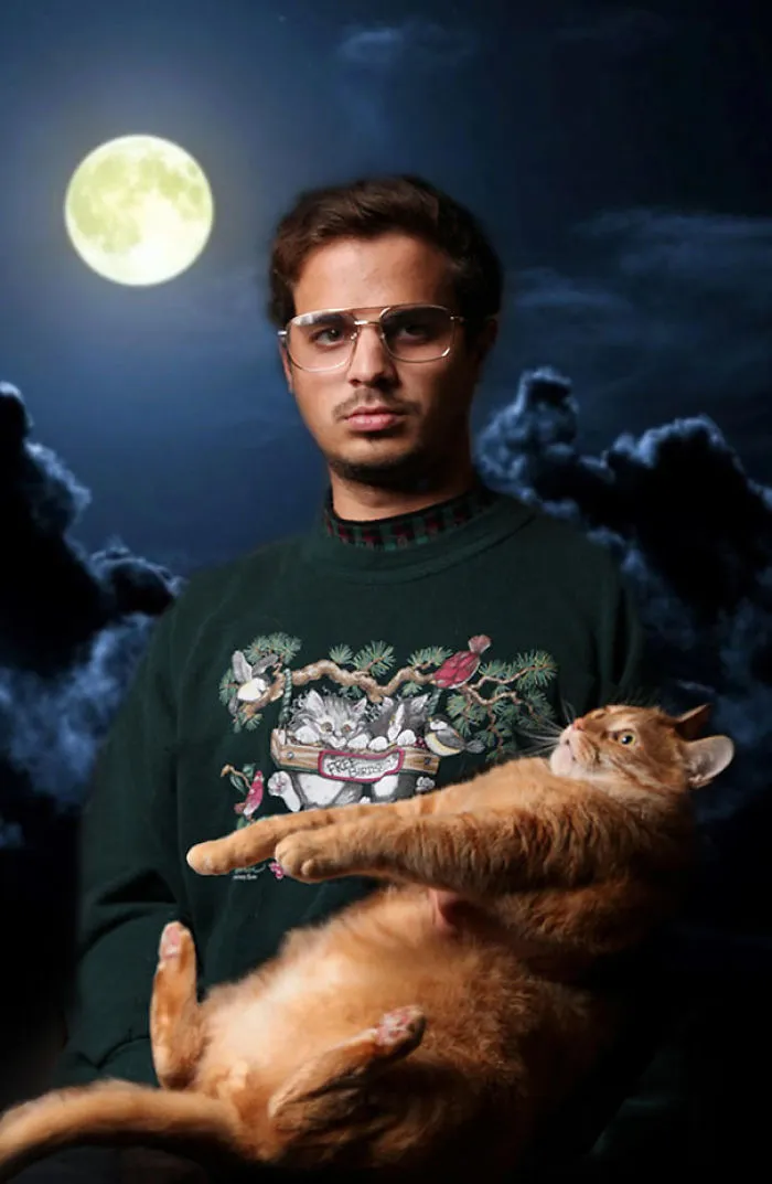 28 Awkward Vintage Photos Of Men Posing With Their Cats