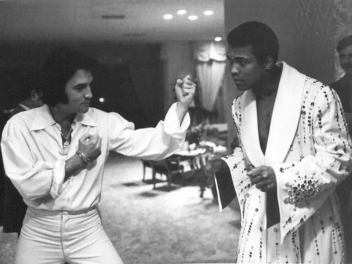 Elvis And Ali In The Kings Hilton Hotel Suite In 1973 Where Elvis Presented Ali A  Special One Of A Kind Robe Designed Just Like Famous Stage Jumpsuits