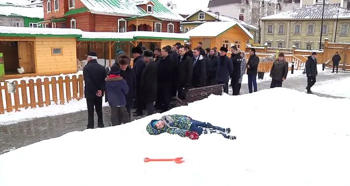 Little Boy Pretended To Be Sleeping When Noticed  Official Delegation