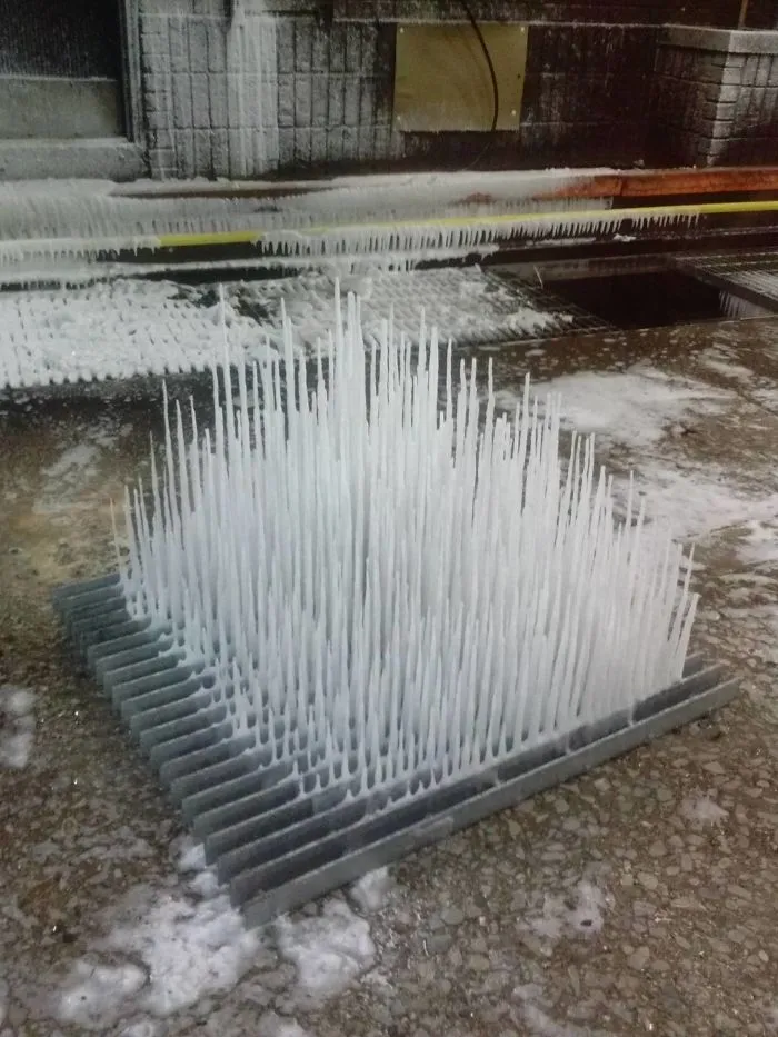 Inverted Icicles - Flipped A Drainage Pit Grate At Work