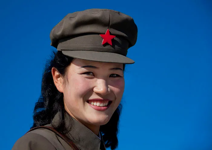 Female Soldier Smiling Wearing Cap With Red Star, Samjiyon Ryanggang, North Korea