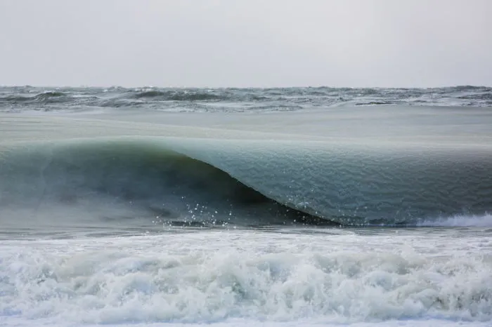 Freezing Ocean Waves Turned Into Slurpee During The Coldest Winter We've Had In 81 Years