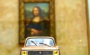 A Night Guard At The Louvre Takes Photos Of His Model Cars Between Shifts
