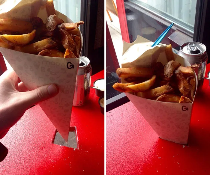 the hole in the table for paper cones with fries