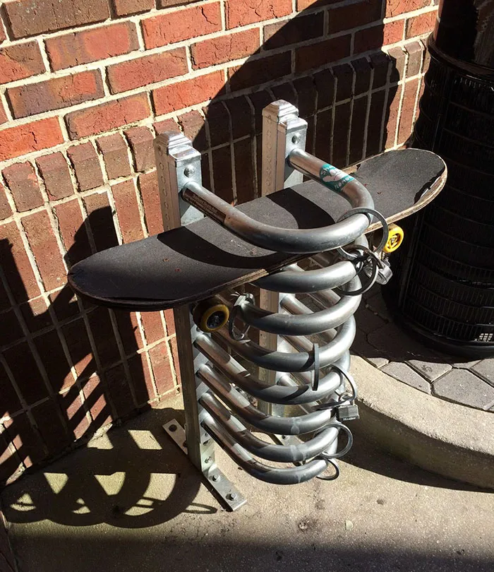parking for skateboards near a brick wall