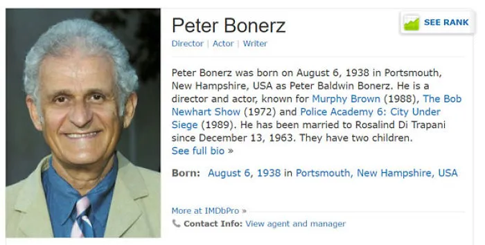 Smiling man in a beige jacket with text about funny names.