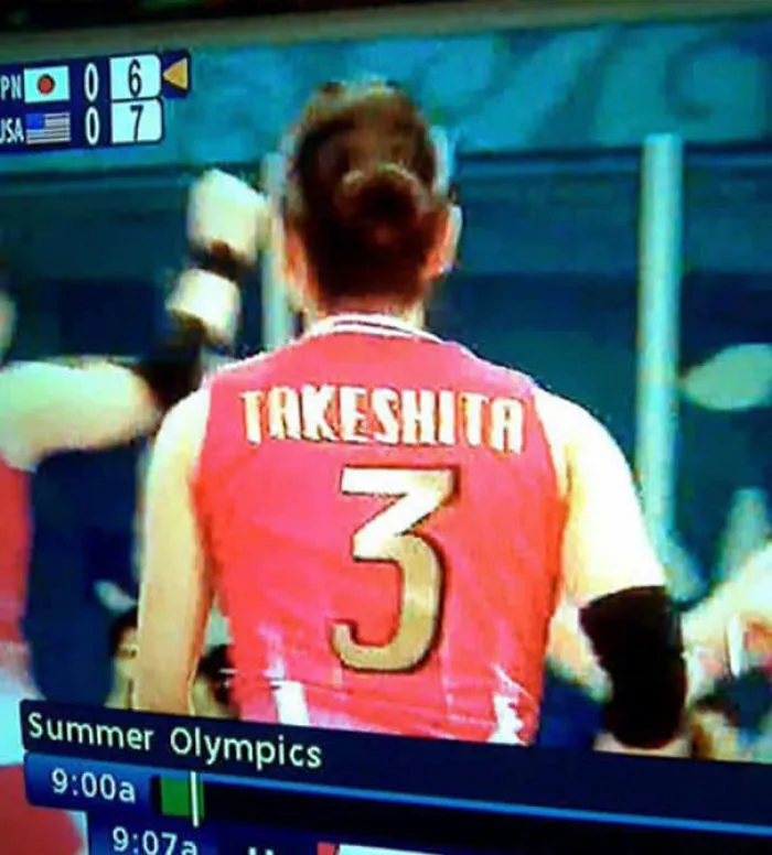 Athlete wearing a jersey with a humorous name at the Summer Olympics.