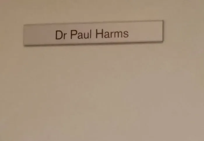 Nameplate reading “Dr. Paul Harms” showcasing a funny name.