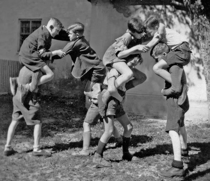 A Group Of Boys Aged Between 8 - 14 Out At Play