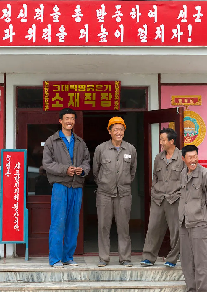 Workers During A Break, Nampho, North Korea