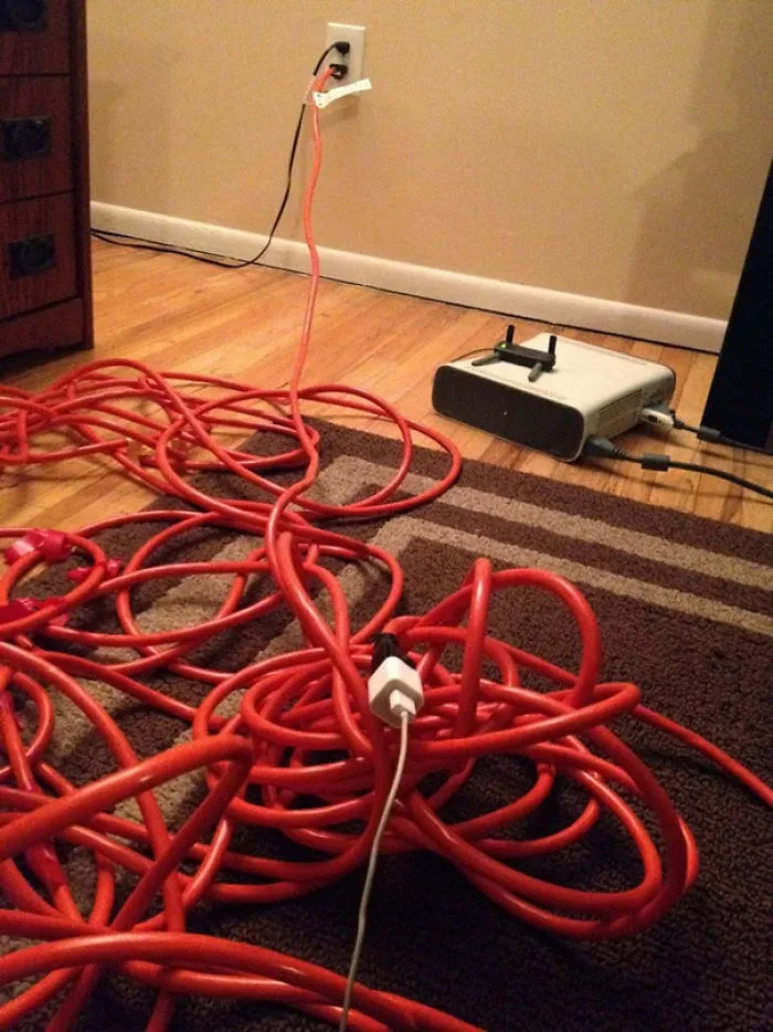Use An Extension Cord To Maximize The Length When Phone Charger Is Too Short To Reach The Outlet