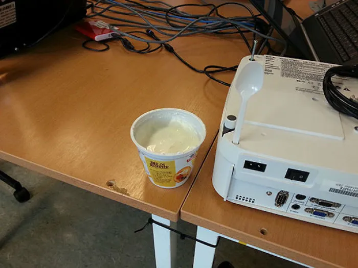 Use A Projector Instead Of Spilling Yoghurt Everywhere When Your Spoon Is Constantly Tipping Over Your Yoghurt Container