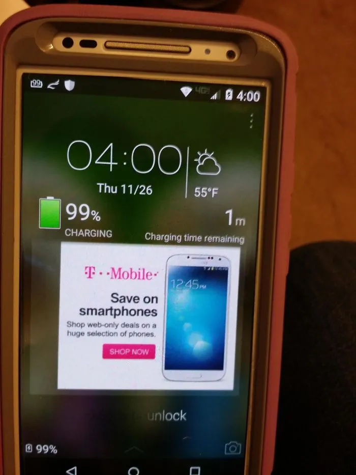 Smartphone screen showing 99% charge, 1 minute remaining, humorous tech fail example.