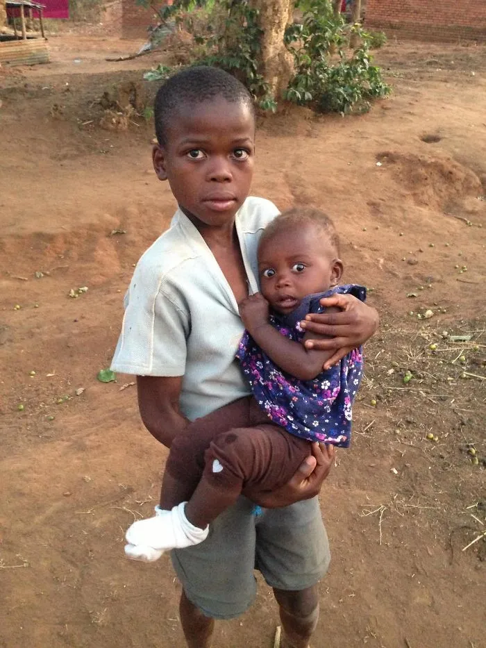 African Baby Seeing A White Person For The First Time