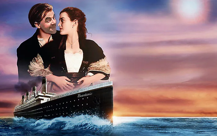 Photoshopped image of Mr. Bean’s face on Titanic characters in a humorous mashup at sunset on the ocean.