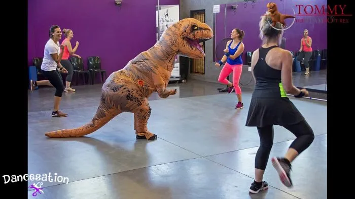 It Started As A Normal Latinix™ Workout Class... But Then The Dinosaur Walked In...