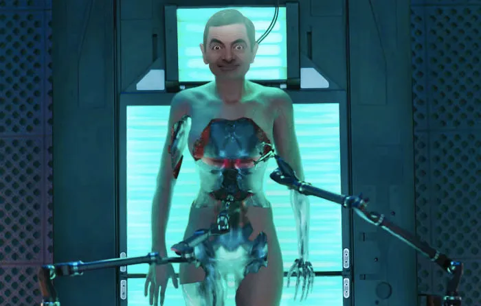 Mr. Bean photoshopped as a futuristic robot undergoing a high-tech procedure in a sci-fi setting.
