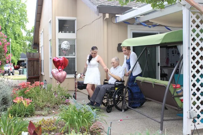 Wedding In The Back Yard So Grandpa Could Be There To Give Granddaughter Away..